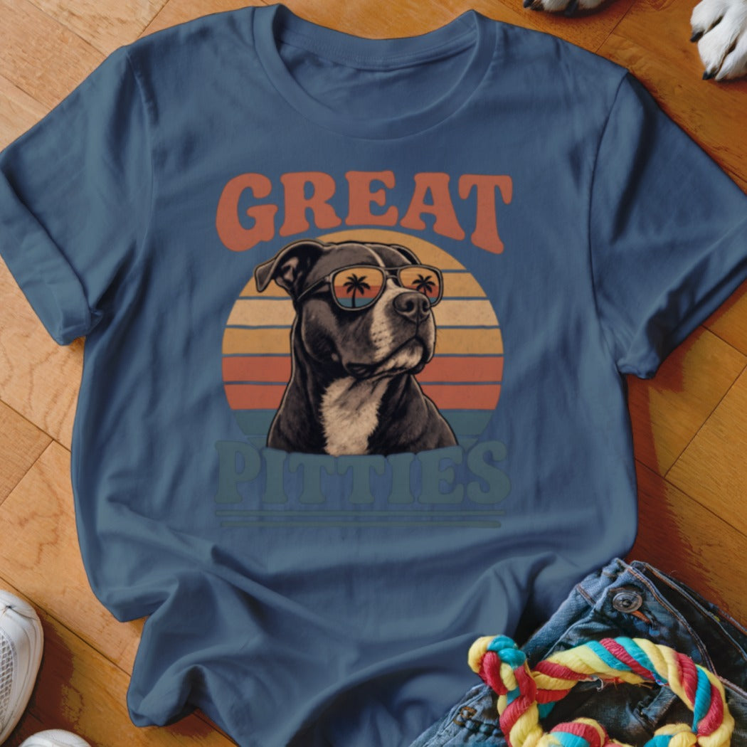 Blue t-shirt with a graphic of a pit bull wearing sunglasses and palm trees, saying "Great Pitties".