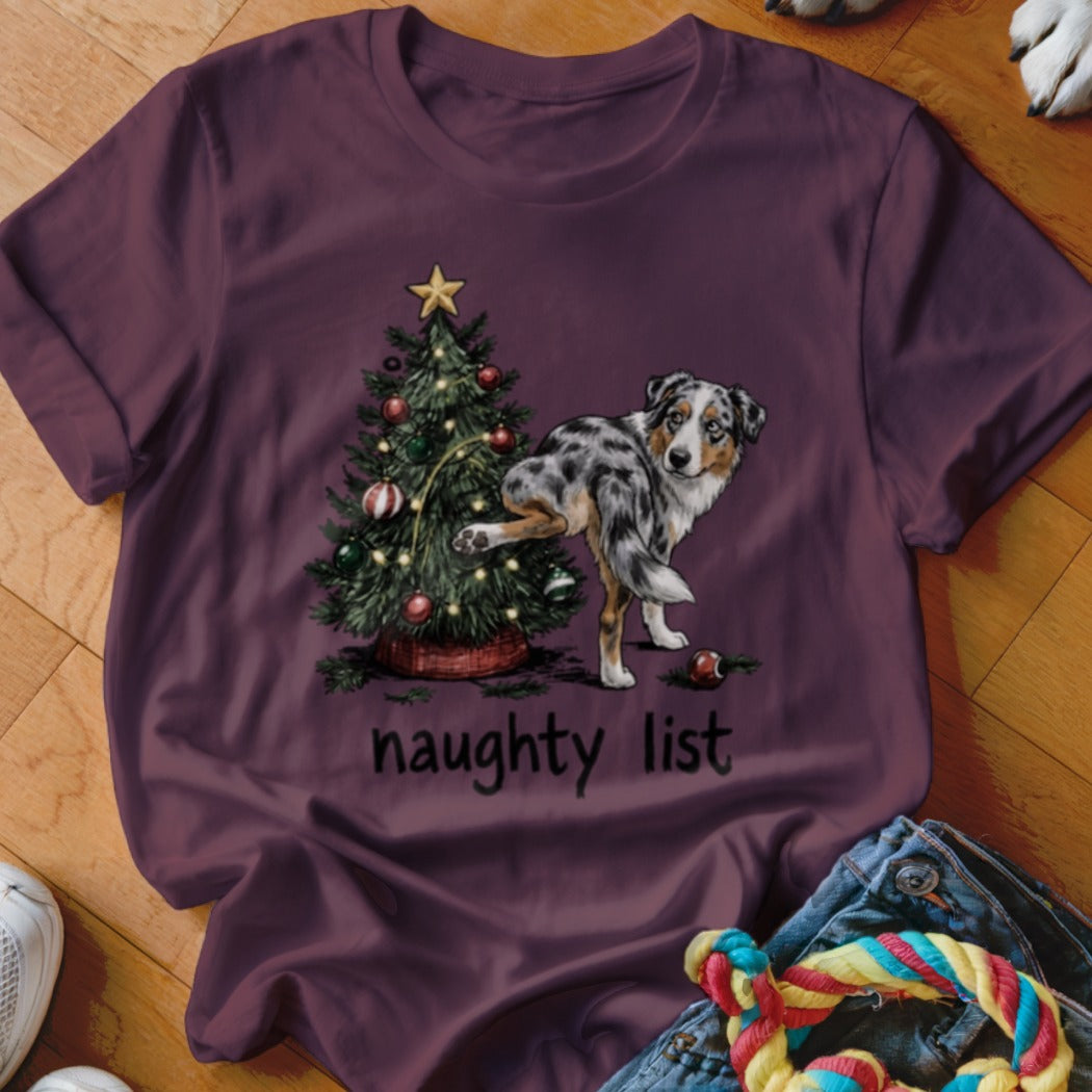 Maroon t-shirt with Australian Shepherd near Christmas tree and "naughty list" text.