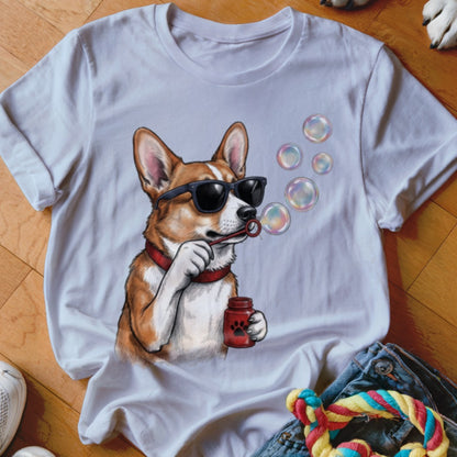 A white crewneck t-shirt featuring a graphic of a corgi wearing sunglasses and blowing bubbles.