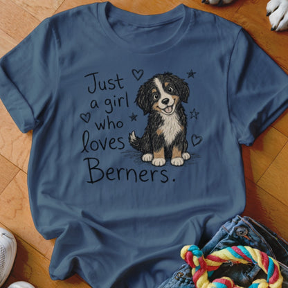 T-shirt graphic with text "Just a girl who loves Berners." and a cartoon Bernese Mountain Dog.
