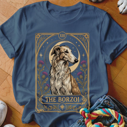 A navy blue t-shirt printed with a tarot card graphic featuring a borzoi dog.