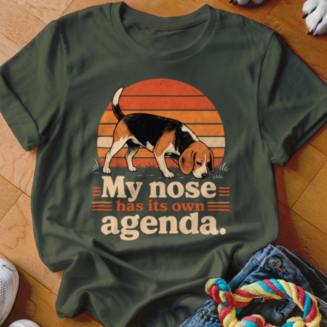 Beagle sniffing with text "My nose has its own agenda."