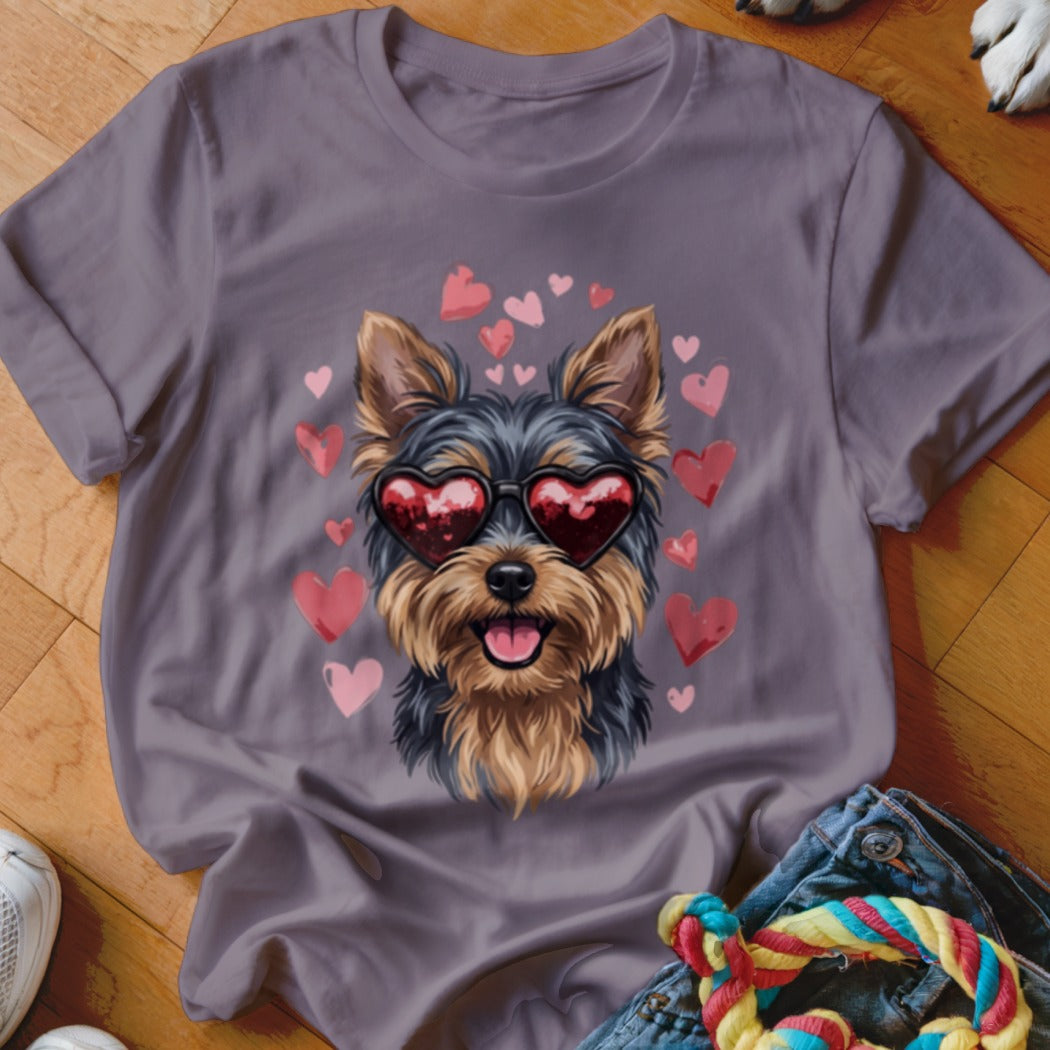 A grey short-sleeved t-shirt featuring a Yorkie wearing heart sunglasses surrounded by floating pink hearts.