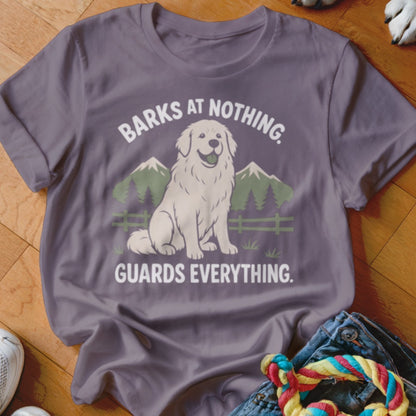 Great Pyrenees graphic with text "BARKS AT NOTHING. GUARDS EVERYTHING." on a purple t-shirt.
