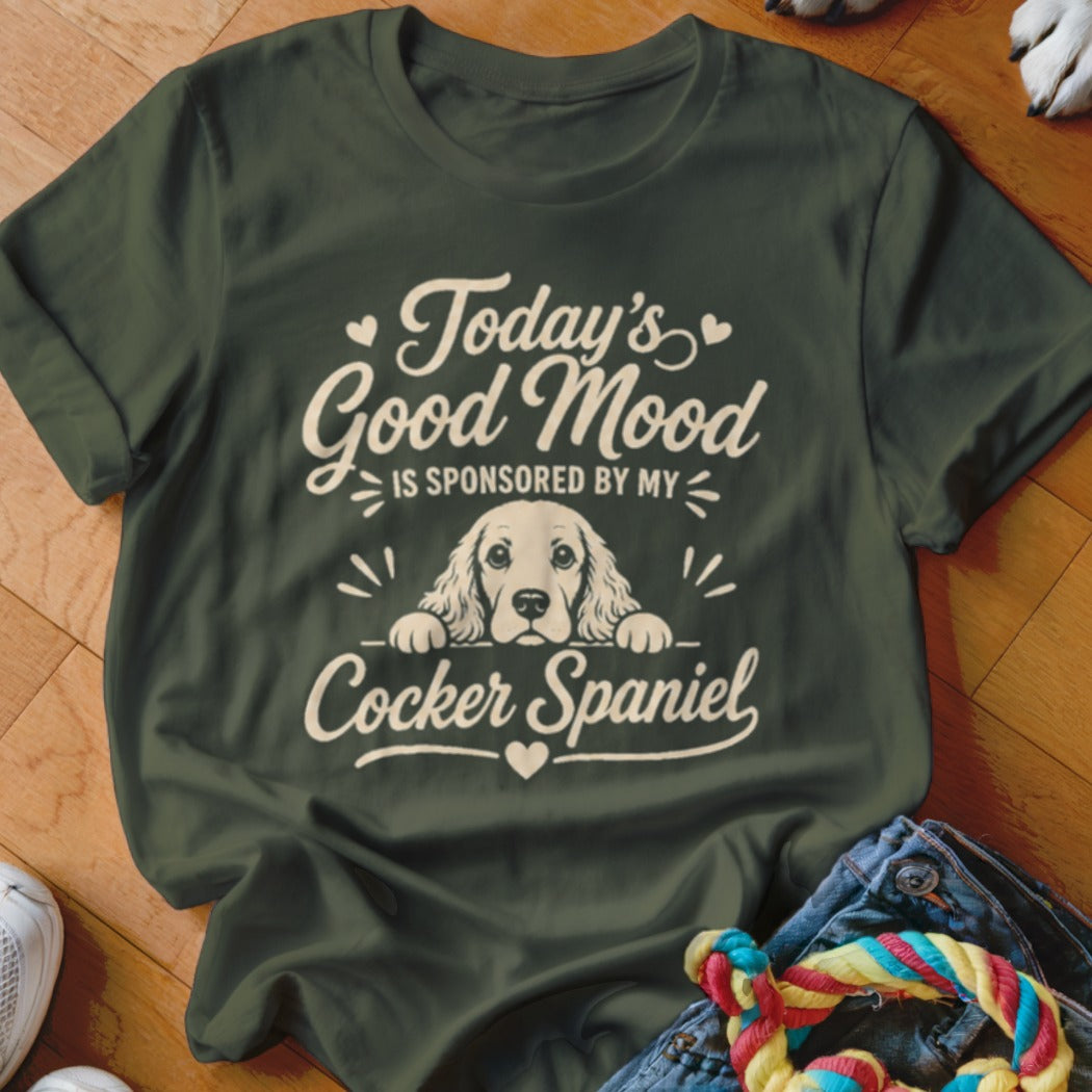 Green t-shirt with text "Today's Good Mood Is Sponsored By My Cocker Spaniel" and a dog graphic.