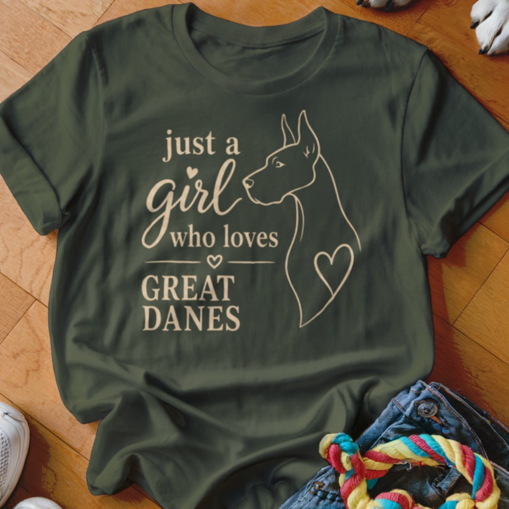 Green t-shirt with white text and outline of a Great Dane dog saying "just a girl who loves GREAT DANES".