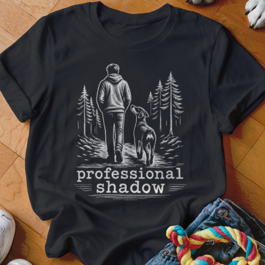 Black t-shirt with sketch of person and dog walking, text "professional shadow".