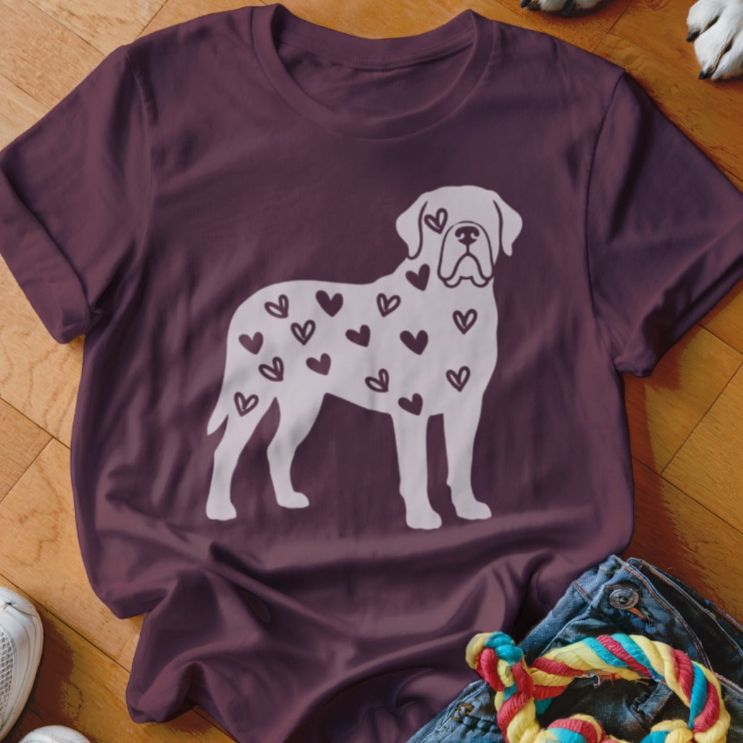 Burgundy t-shirt with a white silhouette of a dog covered in hearts.
