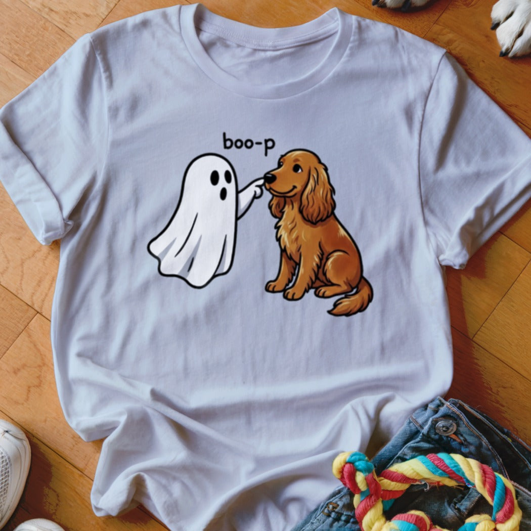 White t-shirt graphic of a ghost booping a golden retriever with the text "boo-p".