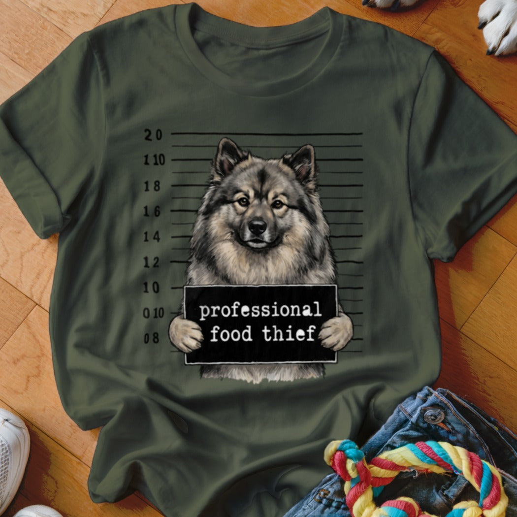T-shirt with a dog in a mugshot holding a "professional food thief" sign.