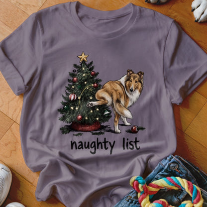 Collie dog with paw on Christmas tree, text "naughty list".