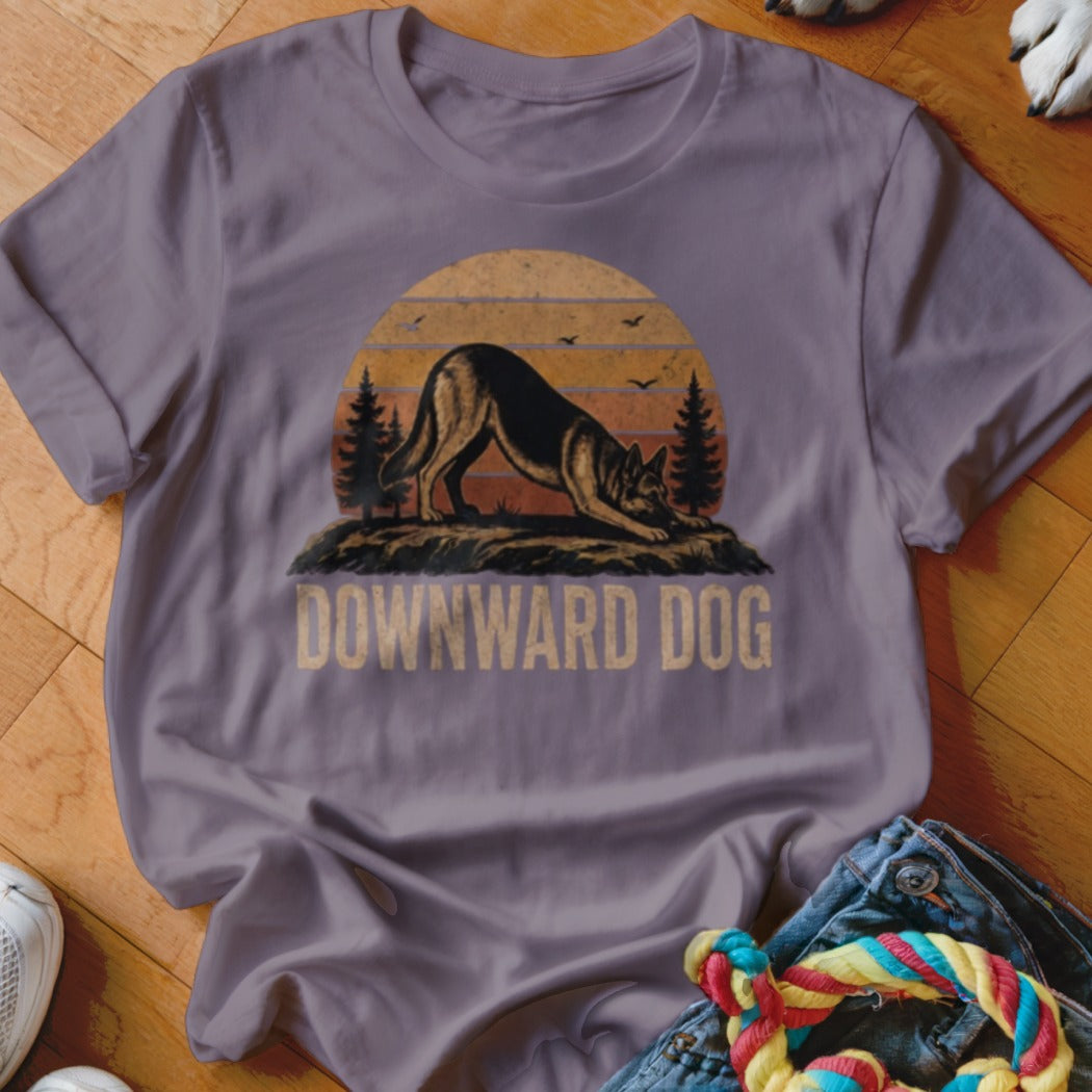 German Shepherd in downward dog pose with sunset and text.