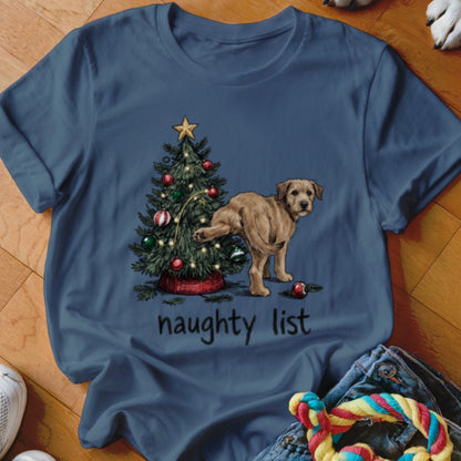Dark blue t-shirt featuring a puppy urinating on a Christmas tree above the text naughty list.