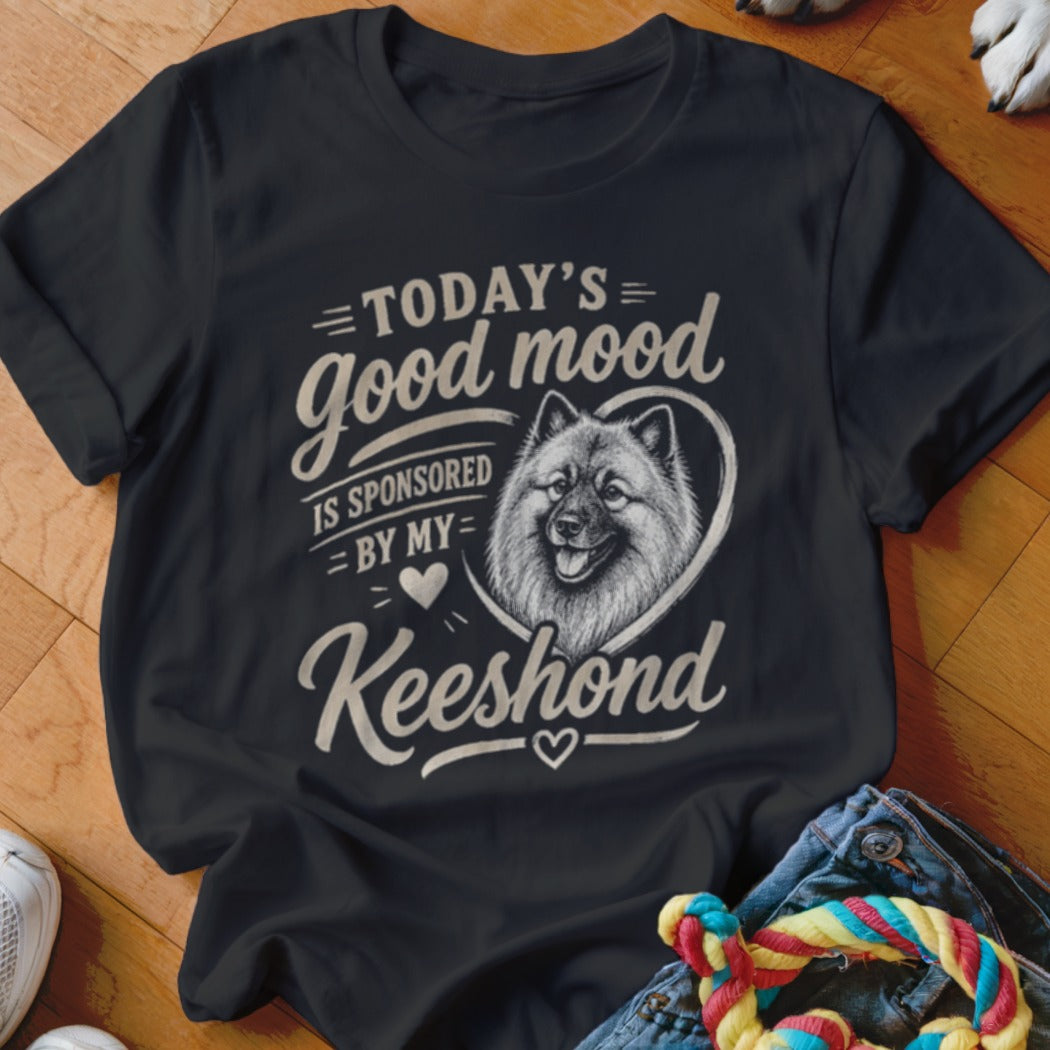 Black t-shirt with text and a Keeshond dog graphic.