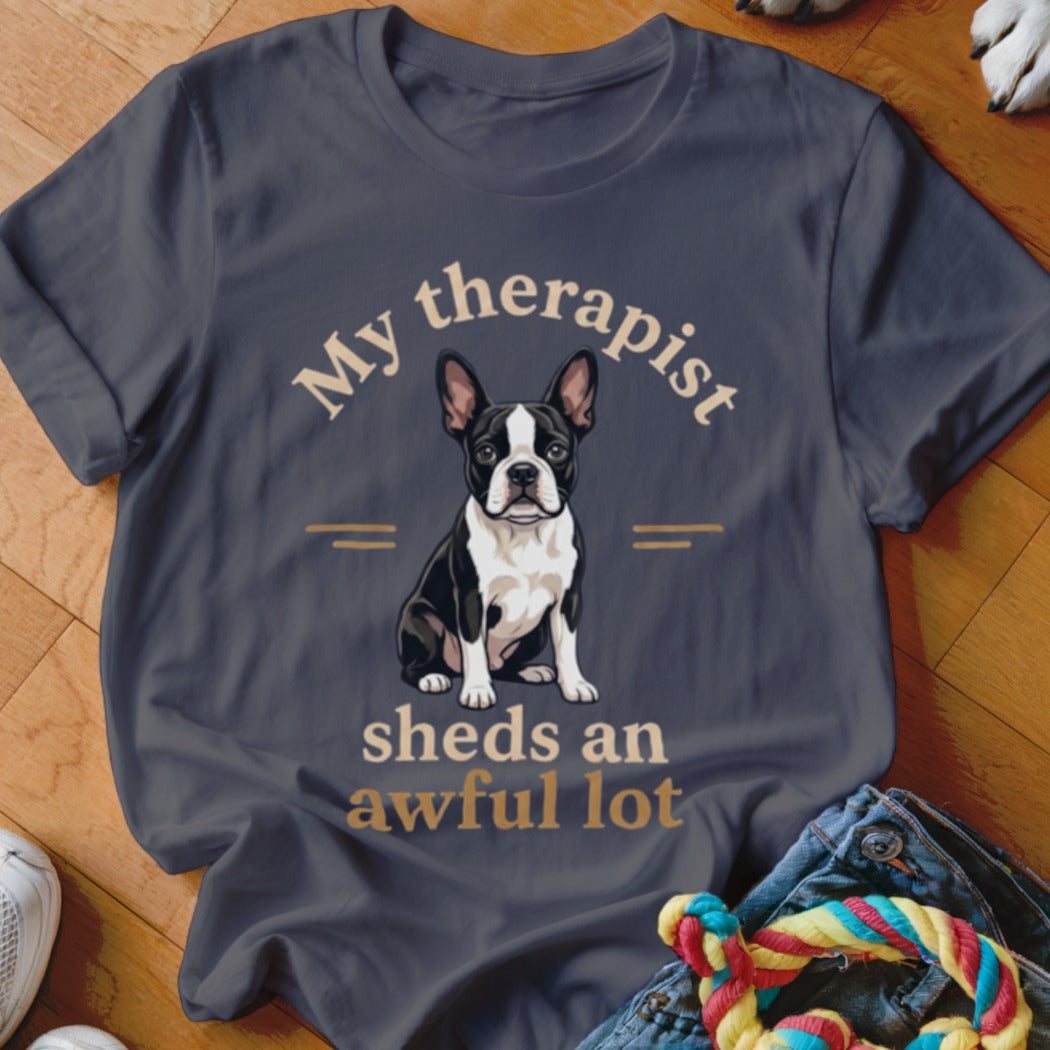 Boston Terrier graphic on a t-shirt with text "My therapist sheds an awful lot".