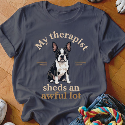 Boston Terrier graphic on a t-shirt with text "My therapist sheds an awful lot".