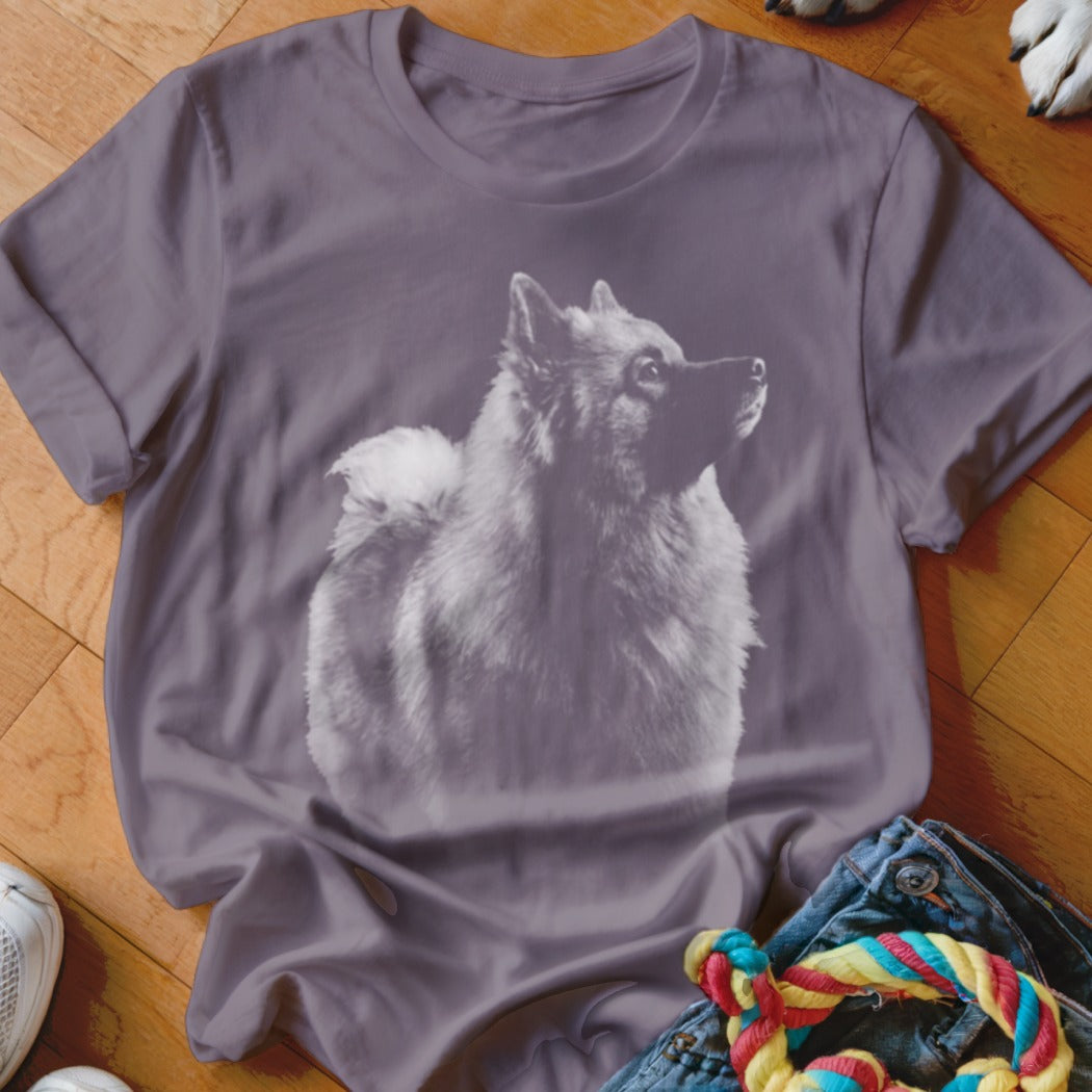 T-shirt with a grayscale print of a fluffy dog looking up and to the right.