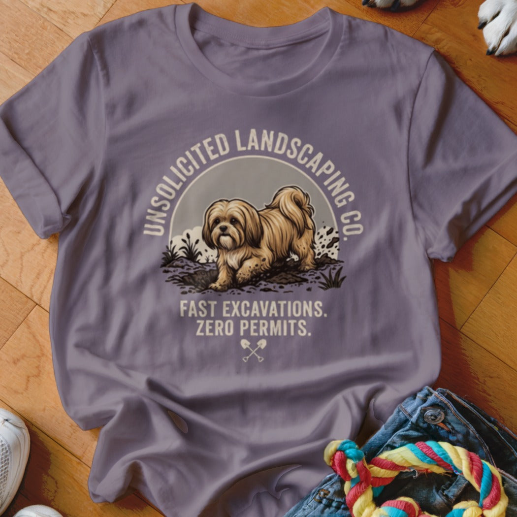 T-shirt graphic: Shih Tzu digging dirt, text "Unsolicited Landscaping Co.", "Fast Excavations. Zero Permits."