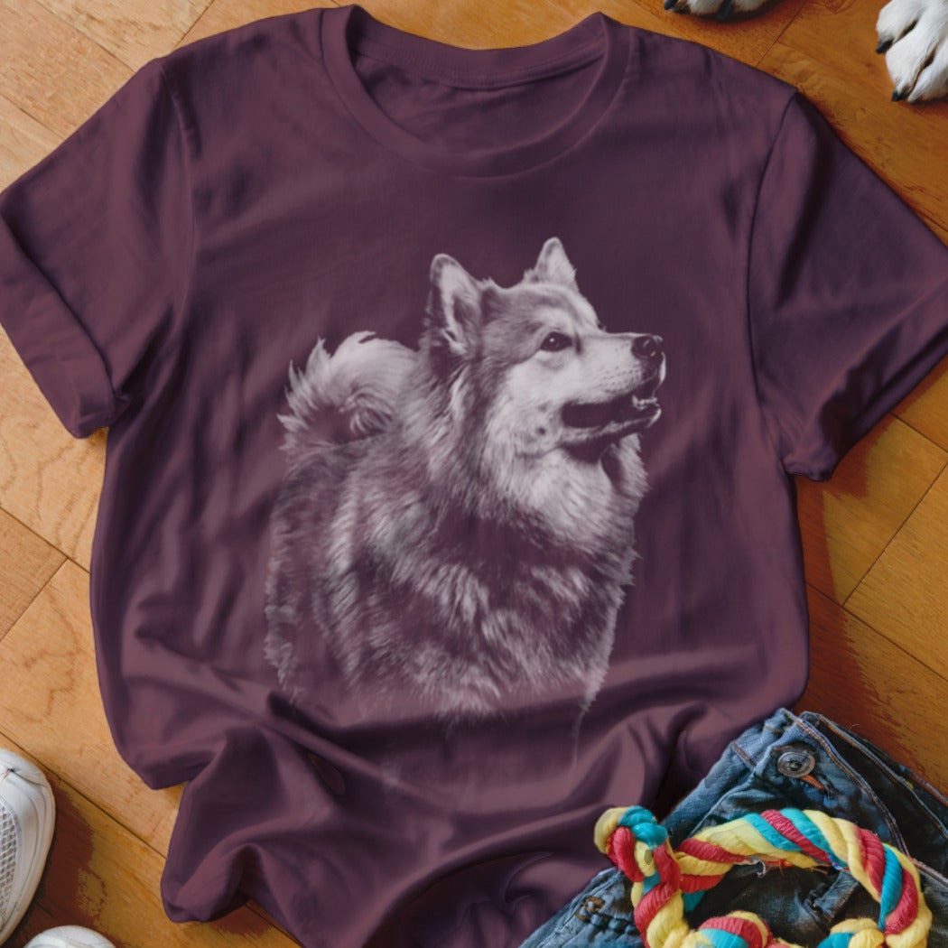 Maroon t-shirt with a graphic of a fluffy dog's head and chest.