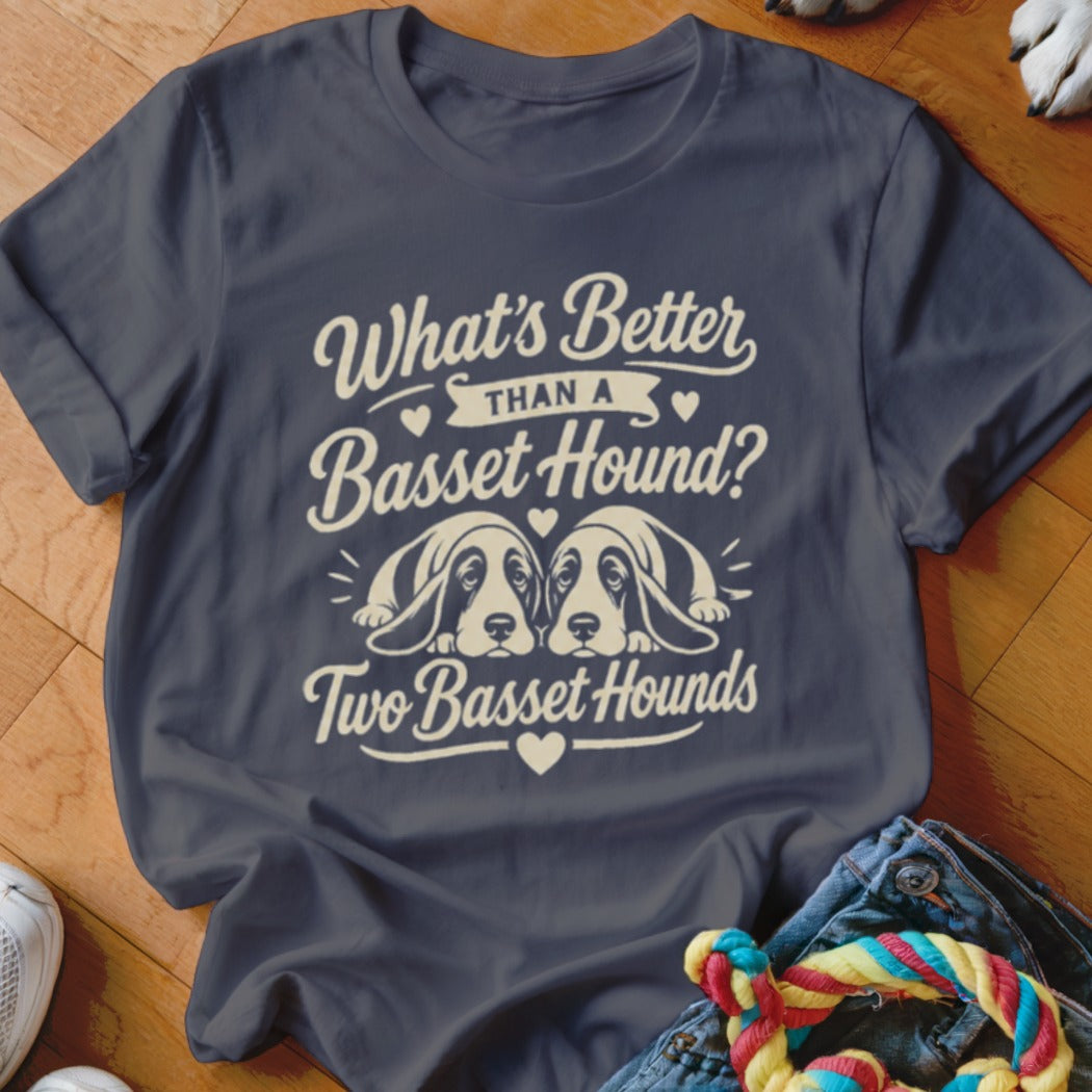 Dark blue t-shirt with "What's Better Than a Basset Hound? Two Basset Hounds" and two dog illustrations.