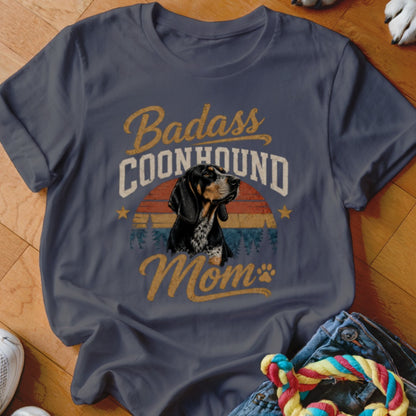 Dark t-shirt with "Badass Coonhound Mom" text and a dog portrait.