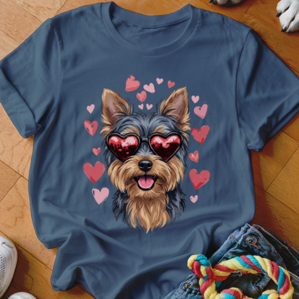 Dark blue t-shirt featuring a graphic of a Yorkshire Terrier wearing heart-shaped sunglasses surrounded by floating pink hearts.