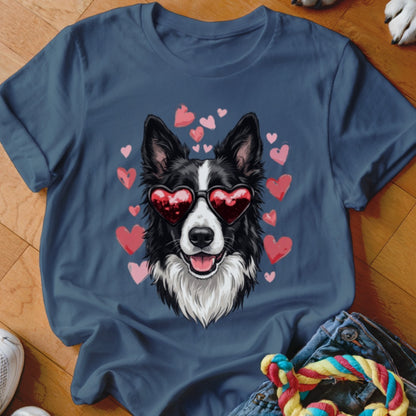 Dark blue t-shirt featuring a graphic of a black and white dog wearing heart-shaped sunglasses, surrounded by pink hearts.