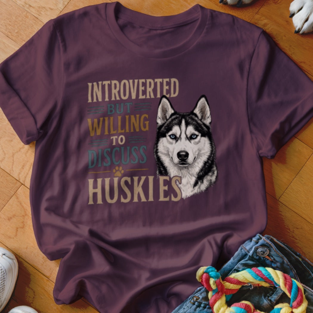 Maroon t-shirt with text "Introverted But Willing to Discuss Huskies" and husky illustration.