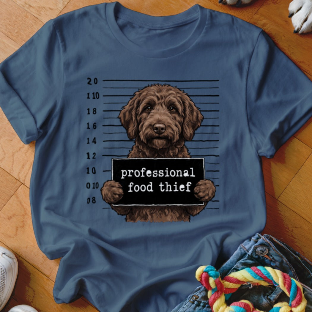 Brown doodle dog mugshot with "professional food thief" sign and height markings.