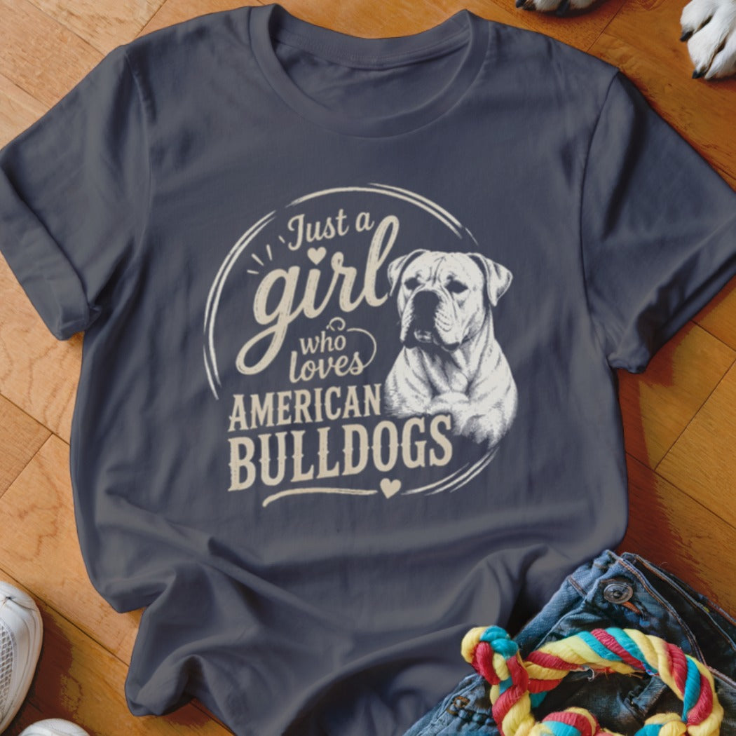 Dark blue t-shirt with "Just a girl who loves American Bulldogs" text and dog illustration.