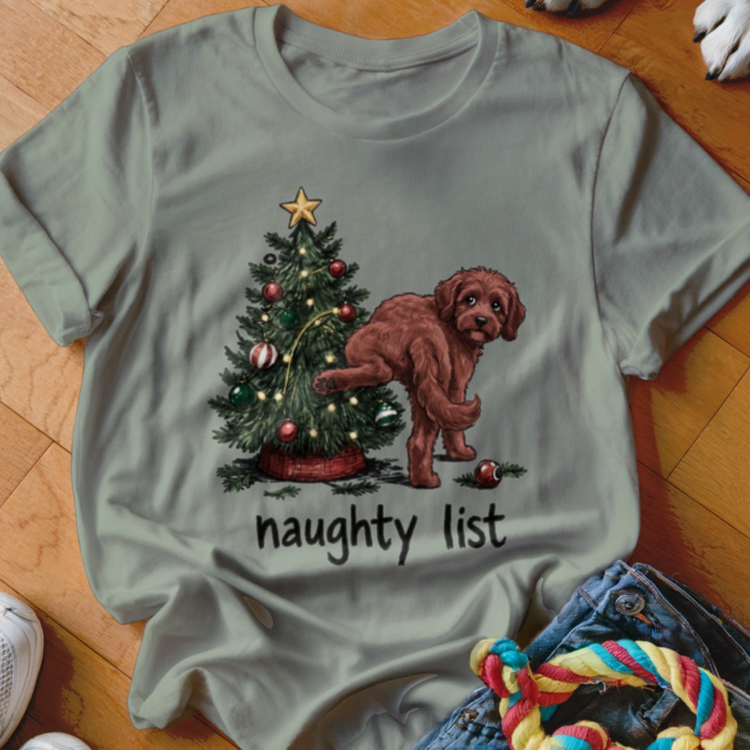 Brown dog near Christmas tree with "naughty list" text.