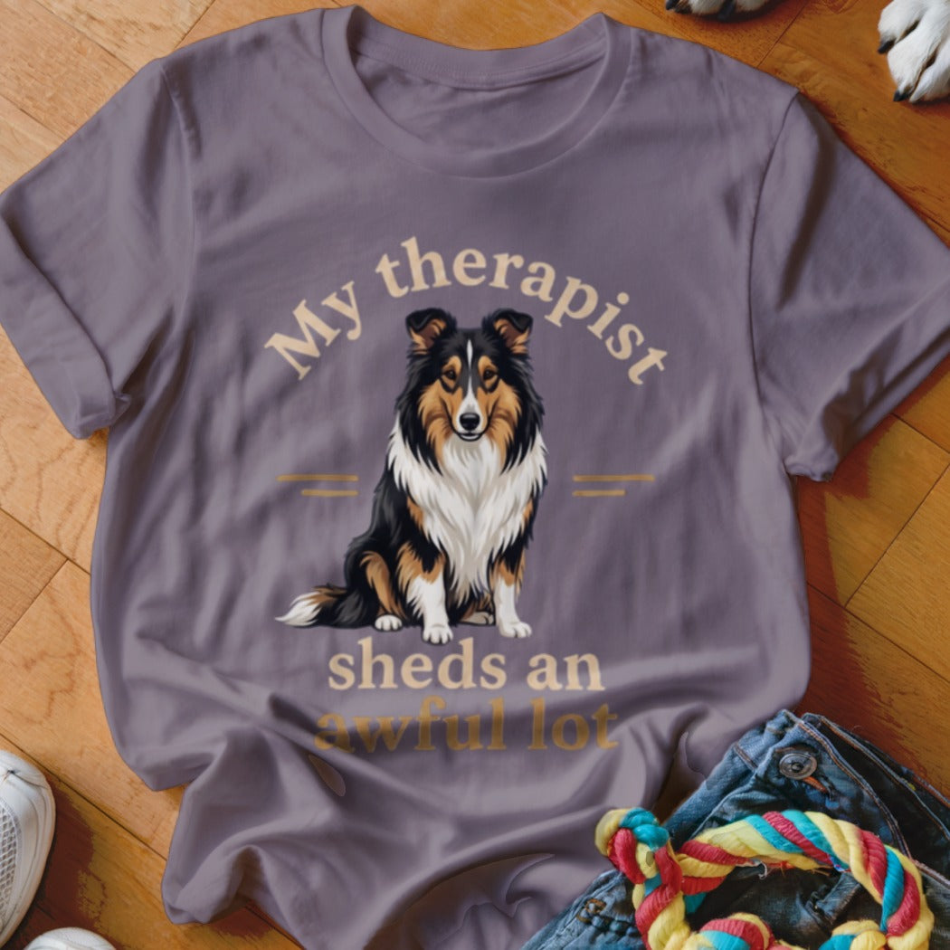 T-shirt with Sheltie dog graphic and text "My therapist sheds an awful lot".
