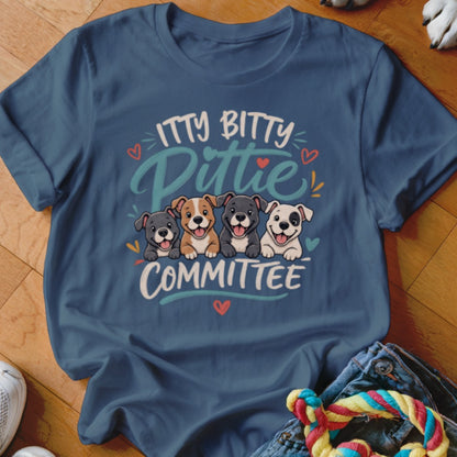 Blue t-shirt with illustration of four puppies and text "ITTY BITTY PITTIE COMMITTEE".