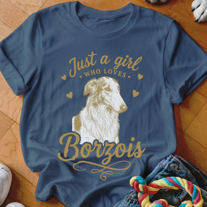 A blue t-shirt printed with a Borzoi graphic and the text Just a girl who loves Borzois.