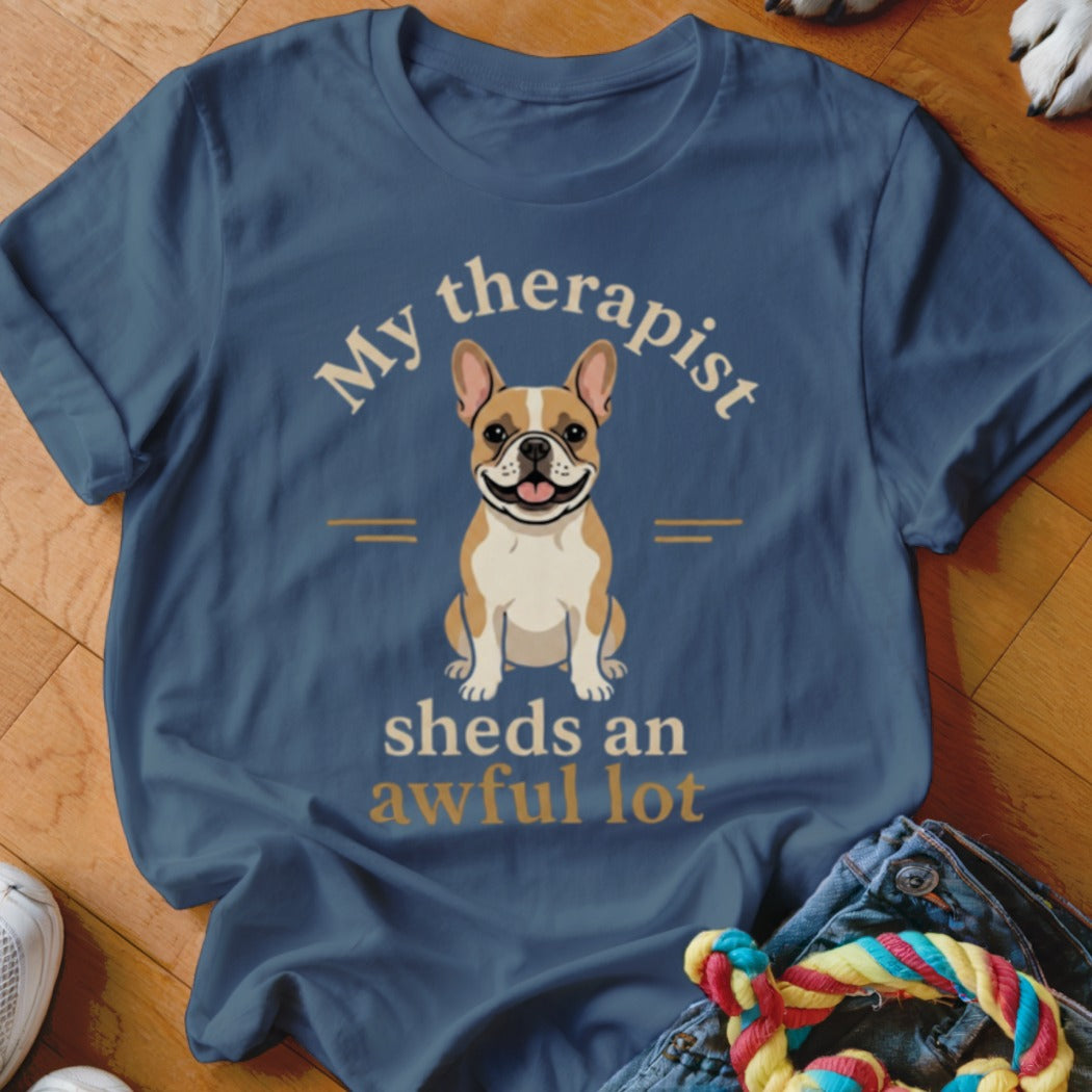 Blue t-shirt with French bulldog and text "My therapist sheds an awful lot".