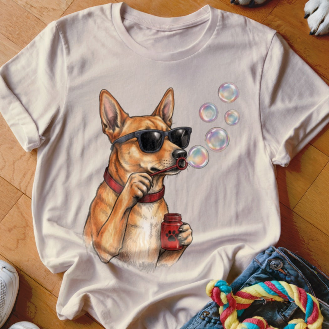 Cream crewneck t-shirt featuring a cartoon dog wearing sunglasses and blowing soap bubbles.