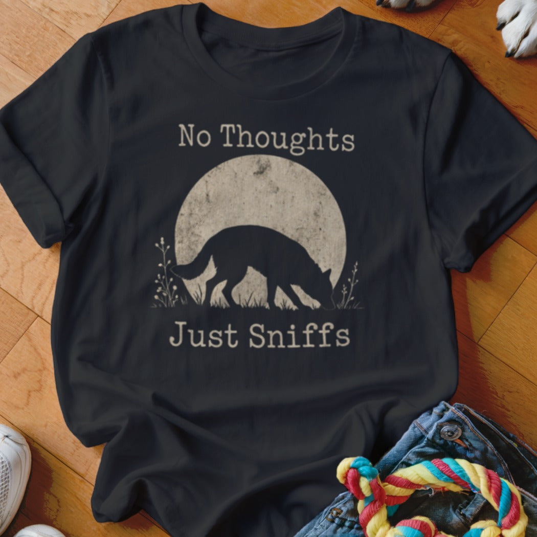Black t-shirt with "No Thoughts Just Sniffs" text and a dog silhouette sniffing grass.