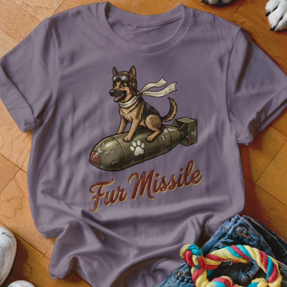 German Shepherd in aviator goggles rides a bomb labeled "Fur Missile".