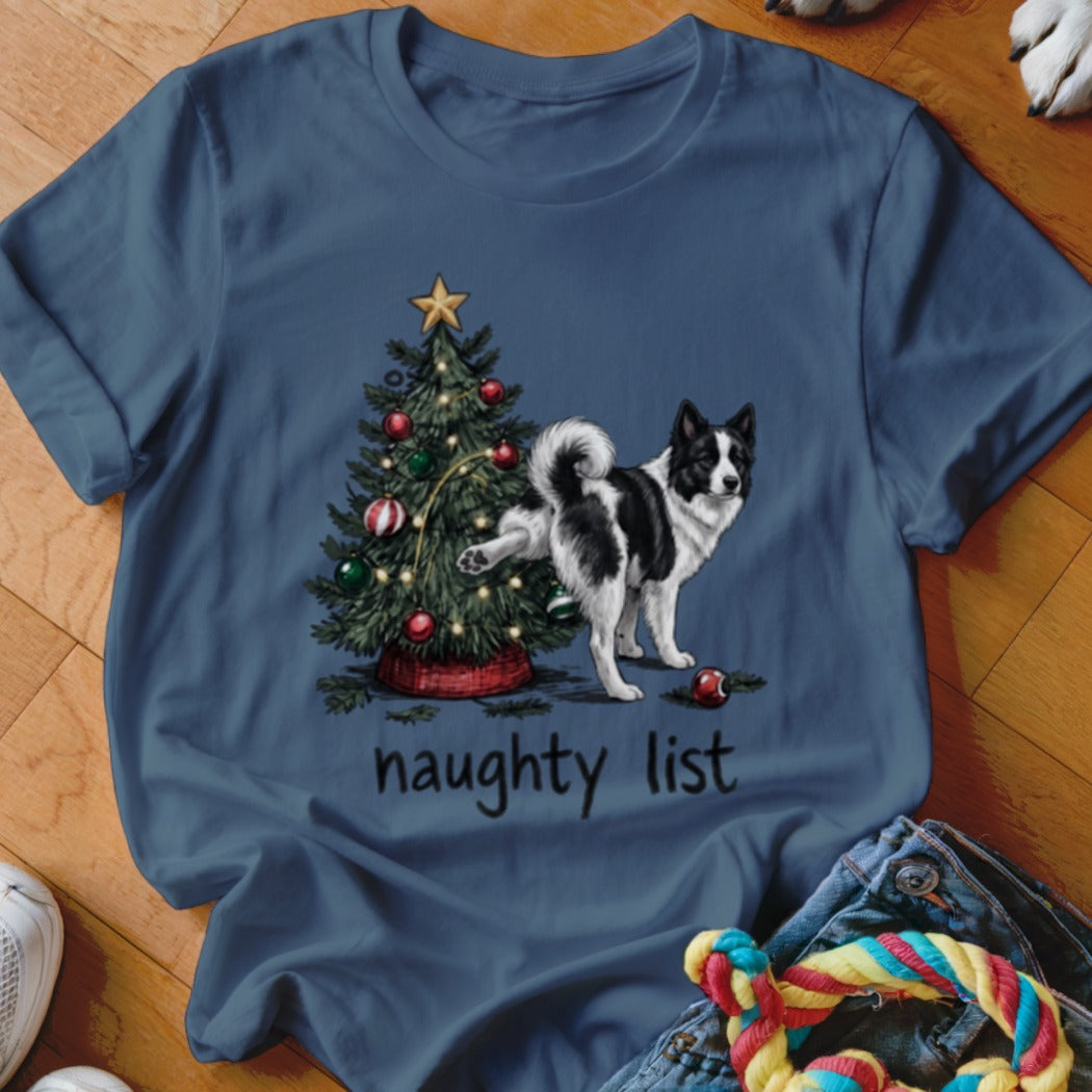 A dark blue t-shirt with a graphic of a dog peeing on a Christmas tree, with the text "naughty list" below.