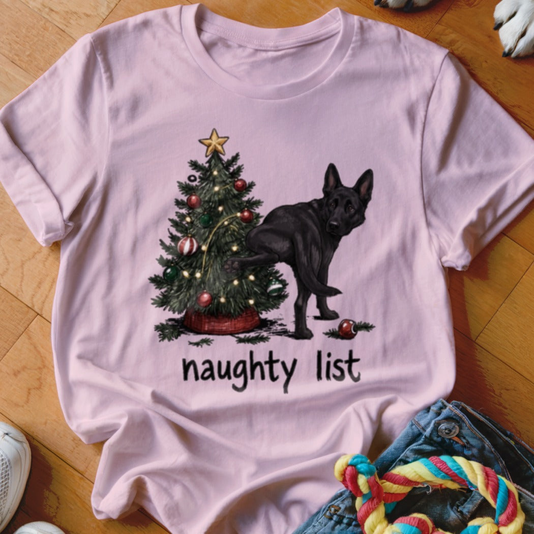Pink t-shirt with black German Shepherd near Christmas tree, reading "naughty list".