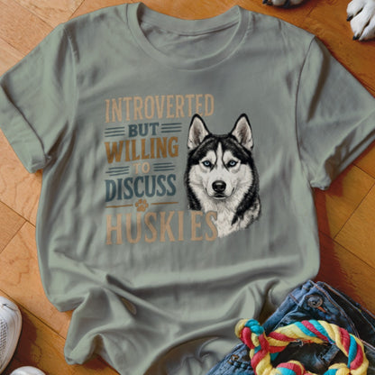 Light blue t-shirt with husky illustration and text "Introverted but willing to discuss huskies."