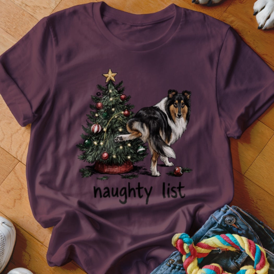 Collie dog peeing on Christmas tree with text "naughty list"