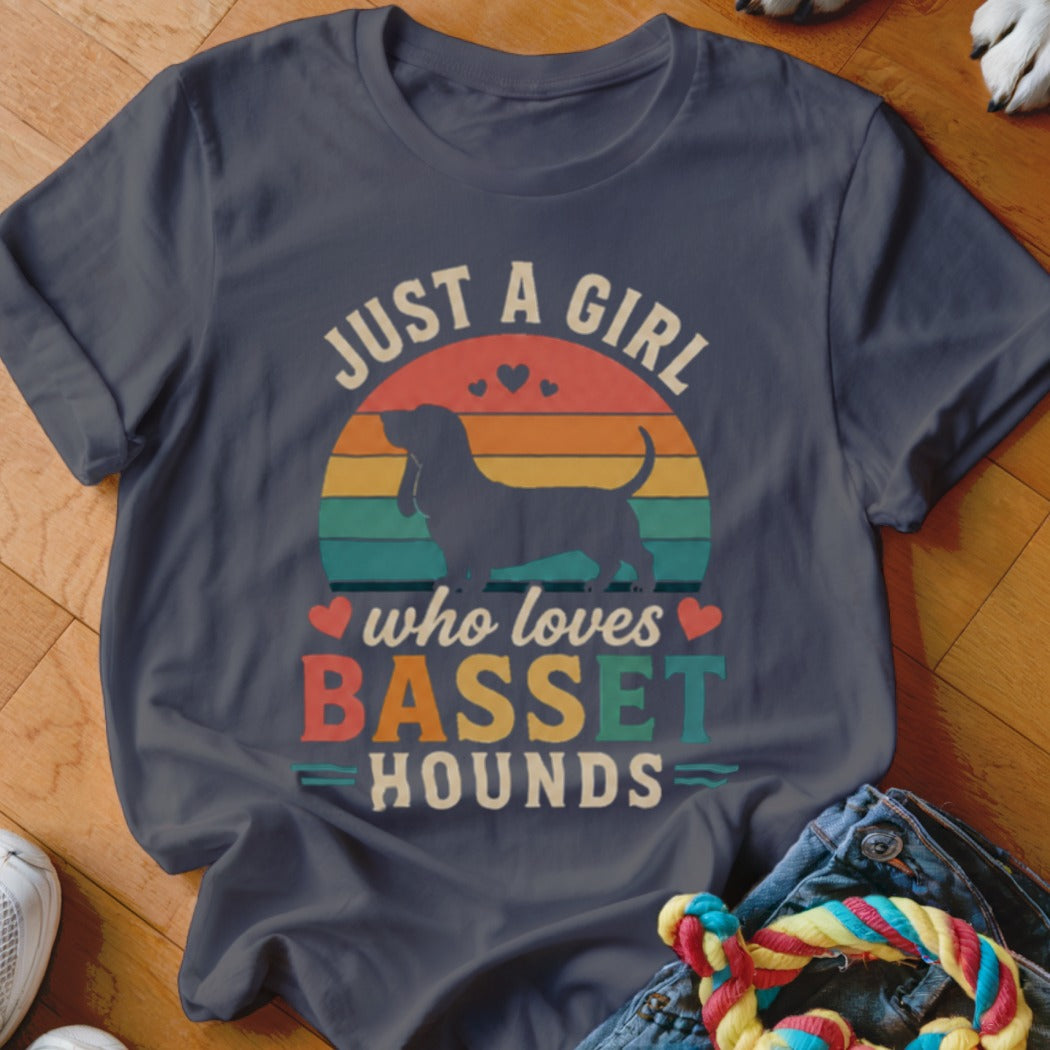 Dark blue t-shirt with "Just a girl who loves Basset Hounds" text and silhouette.