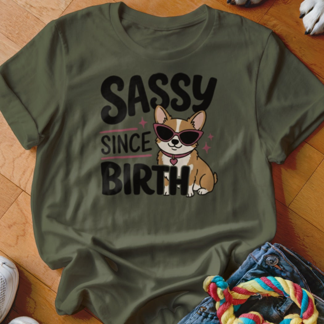 Olive t-shirt with "Sassy Since Birth" text and a corgi wearing sunglasses.