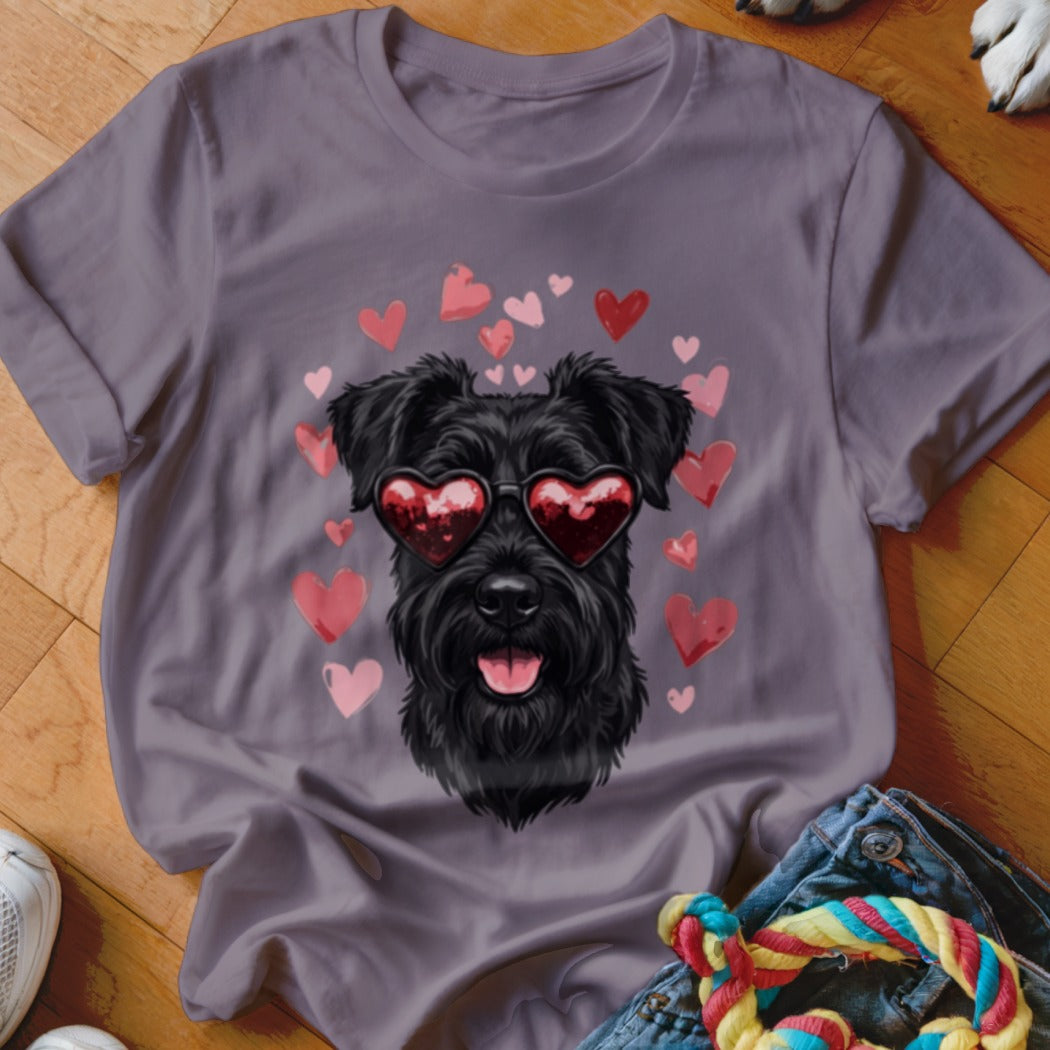 A purple t-shirt featuring a graphic of a black schnauzer wearing heart-shaped sunglasses surrounded by pink hearts.