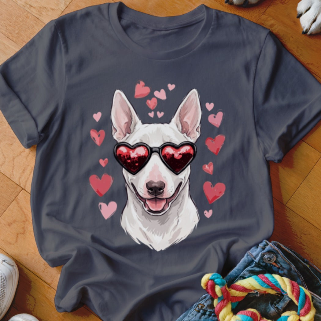 A dark gray t-shirt featuring a graphic of a white bull terrier wearing heart-shaped sunglasses, surrounded by pink hearts.