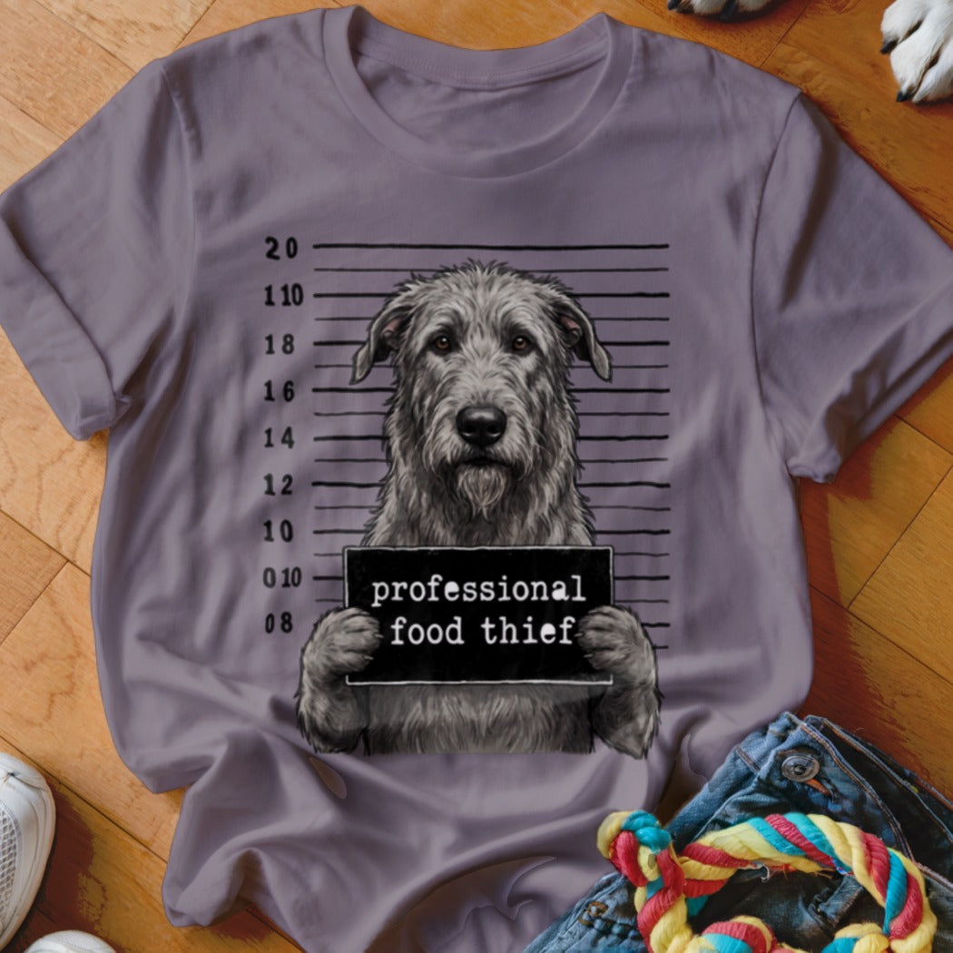 Irish Wolfhound mugshot graphic with text "professional food thief" on a t-shirt.