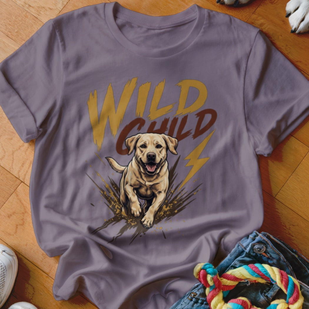 A dusty lavender t-shirt featuring a graphic of a running yellow lab and the text Wild Child.