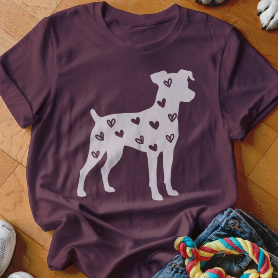 T-shirt with a white dog silhouette filled with small purple hearts.