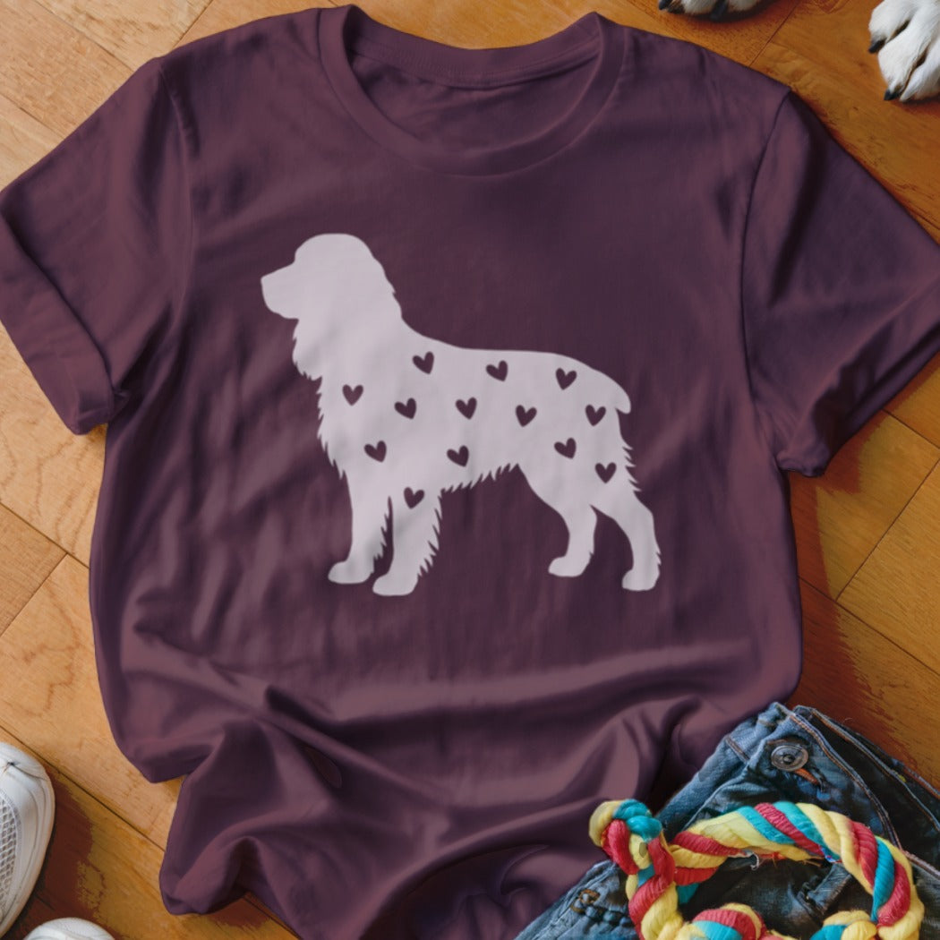 Maroon t-shirt with white silhouette of a dog covered in small hearts.
